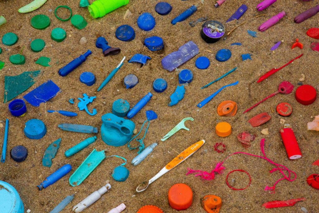 Assortment of plastic trash on the beach